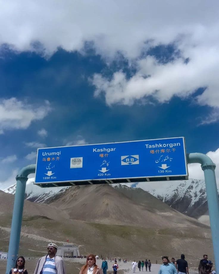 The signboard at the Khunjerab Pass giving the distances to Tashkorgan, Kashgar and Urumqi